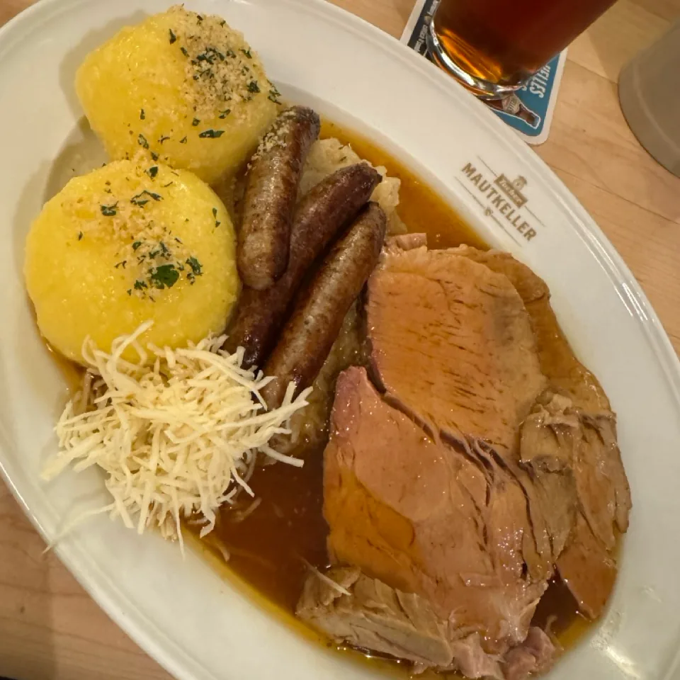 Roast pork with bratwurst