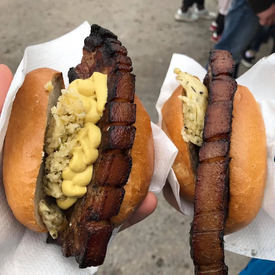 Grilled pork belly with mustard in a roll, from a Volksfest